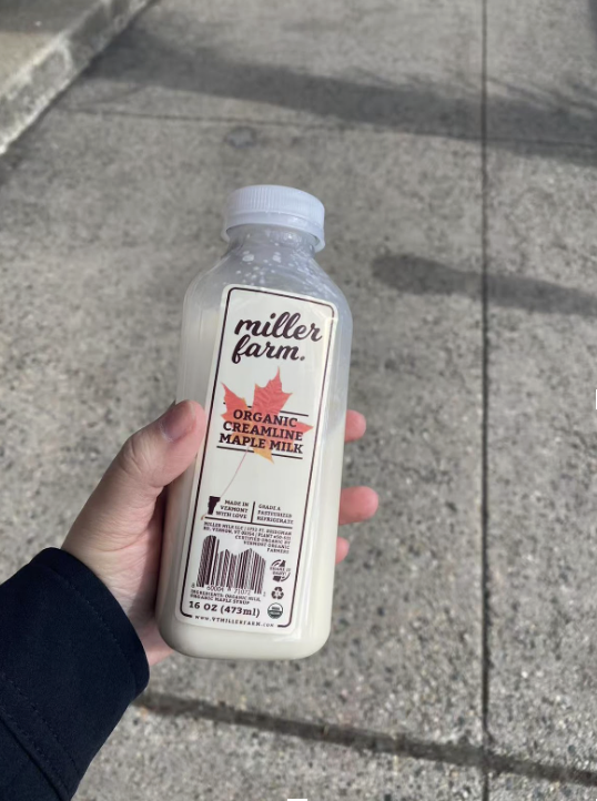 A bottle of maple milk, made in Miller Farm in Vermont and sold at Momma's Grocery in Cambridge, Massachusetts.